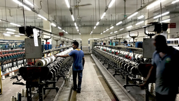 Workers in a modern garment factory